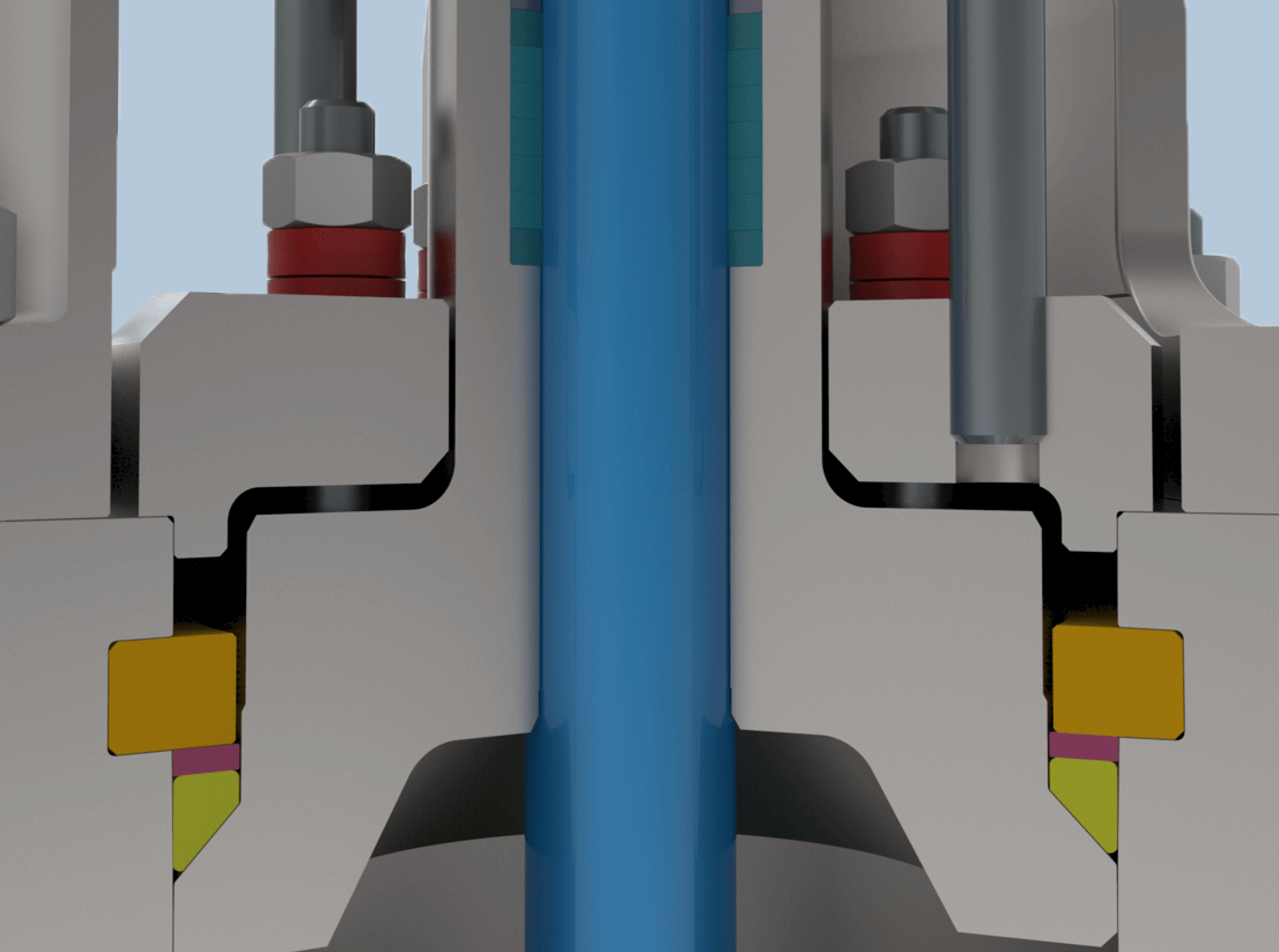 Close-up of a mechanical assembly, featuring a blue cylindrical component surrounded by metallic parts with bolts and colored segments. The design shows intricate interfacing of the machinery.